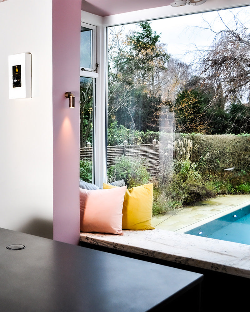 wall lamp in browned brass hanging on wall in kitchen and swimmingpool