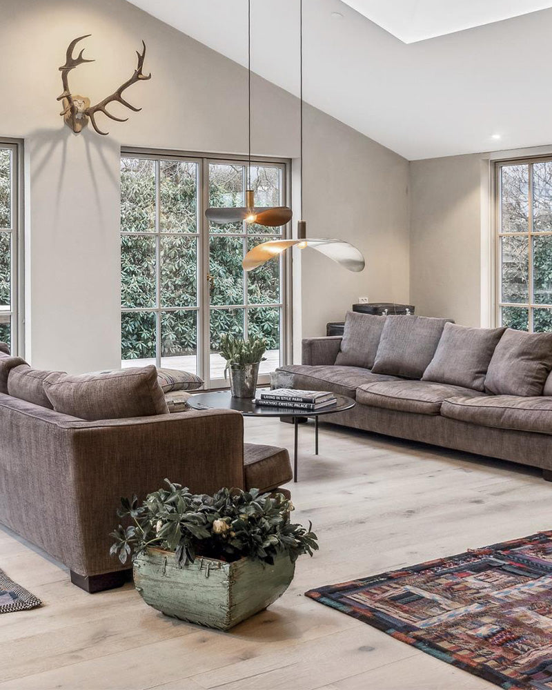 solid browned brass pendant lights in living room