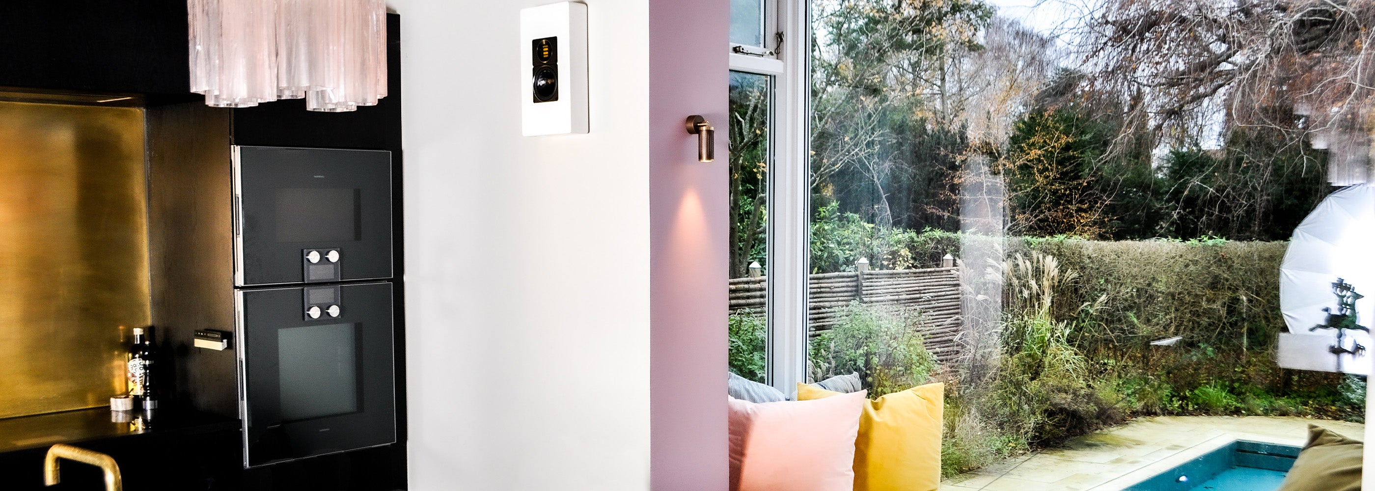 browned brass spot light lamp hanging on a wall in kitchen